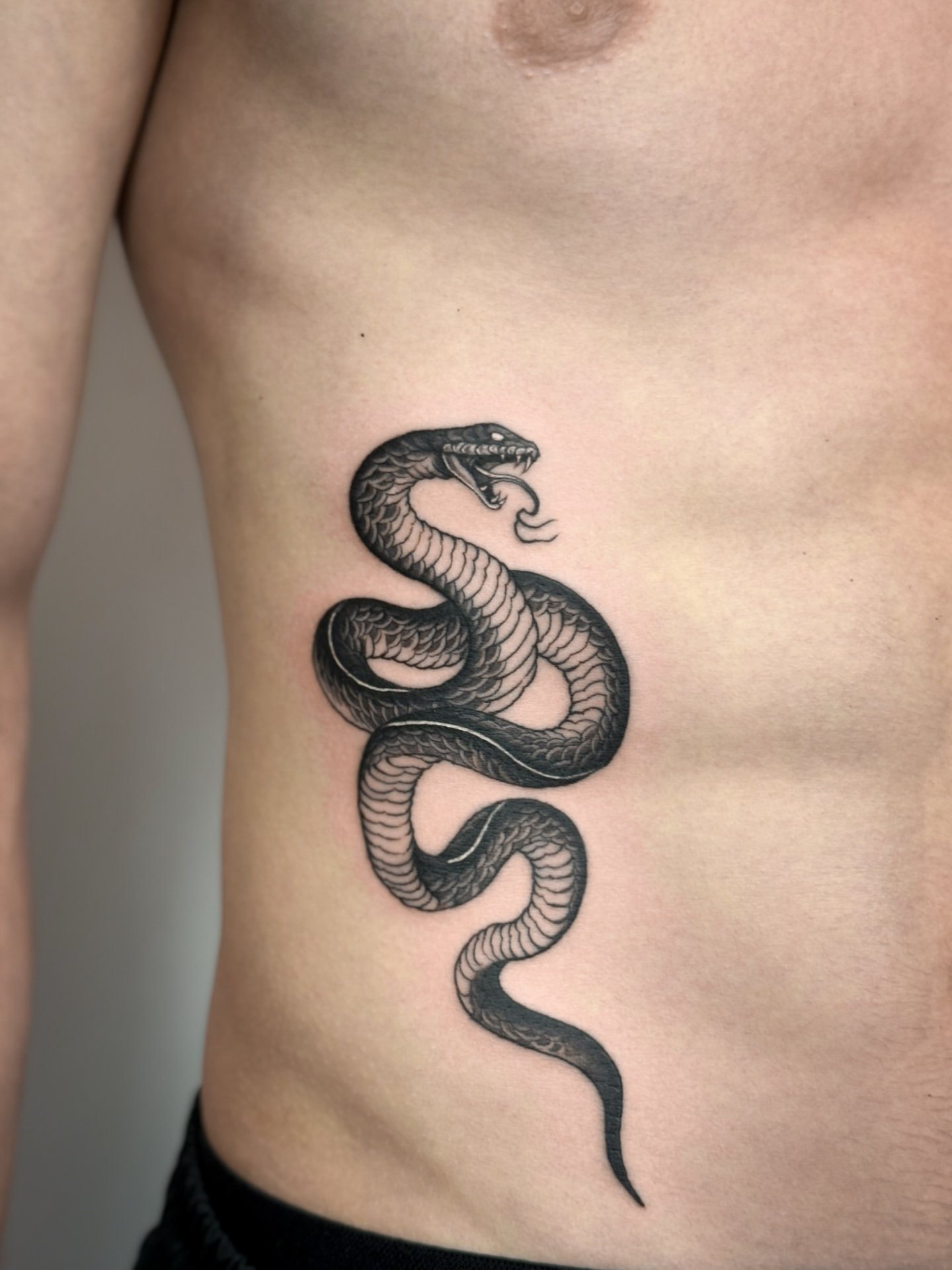 Coiled Serpent — Japanese · Blackwork tattoo by Ana at Blasian Ink